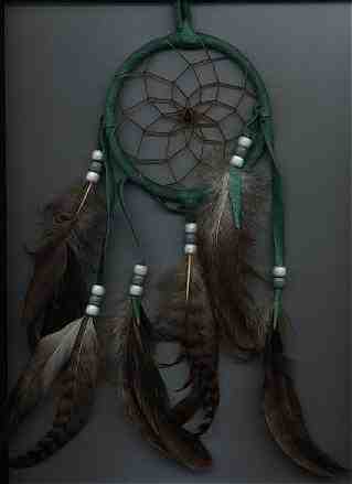 Dream Catcher made by an Ojibwe/Chippewa Indian. "Almost" Kosher style. Leather (7KB/68KB)