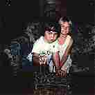 Kevin & Hannah Lighting Hannukah Menorah 1989 (6KB/62KB)