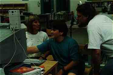 Kevin teaching Leslie Goldman (at Jordan Middle School) how to (7KB/65KB)